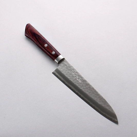 Cuchillo japonés Gyuto de 180mm en acero VG10 con acabado damasco martillado, mango de caoba oscura. Perfecto para carne, pescado y cortes de precisión.